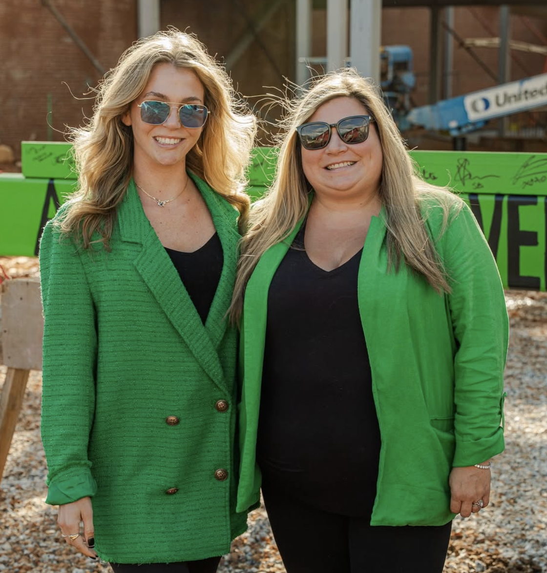 Madi and Tabi at a groundbreaking event
