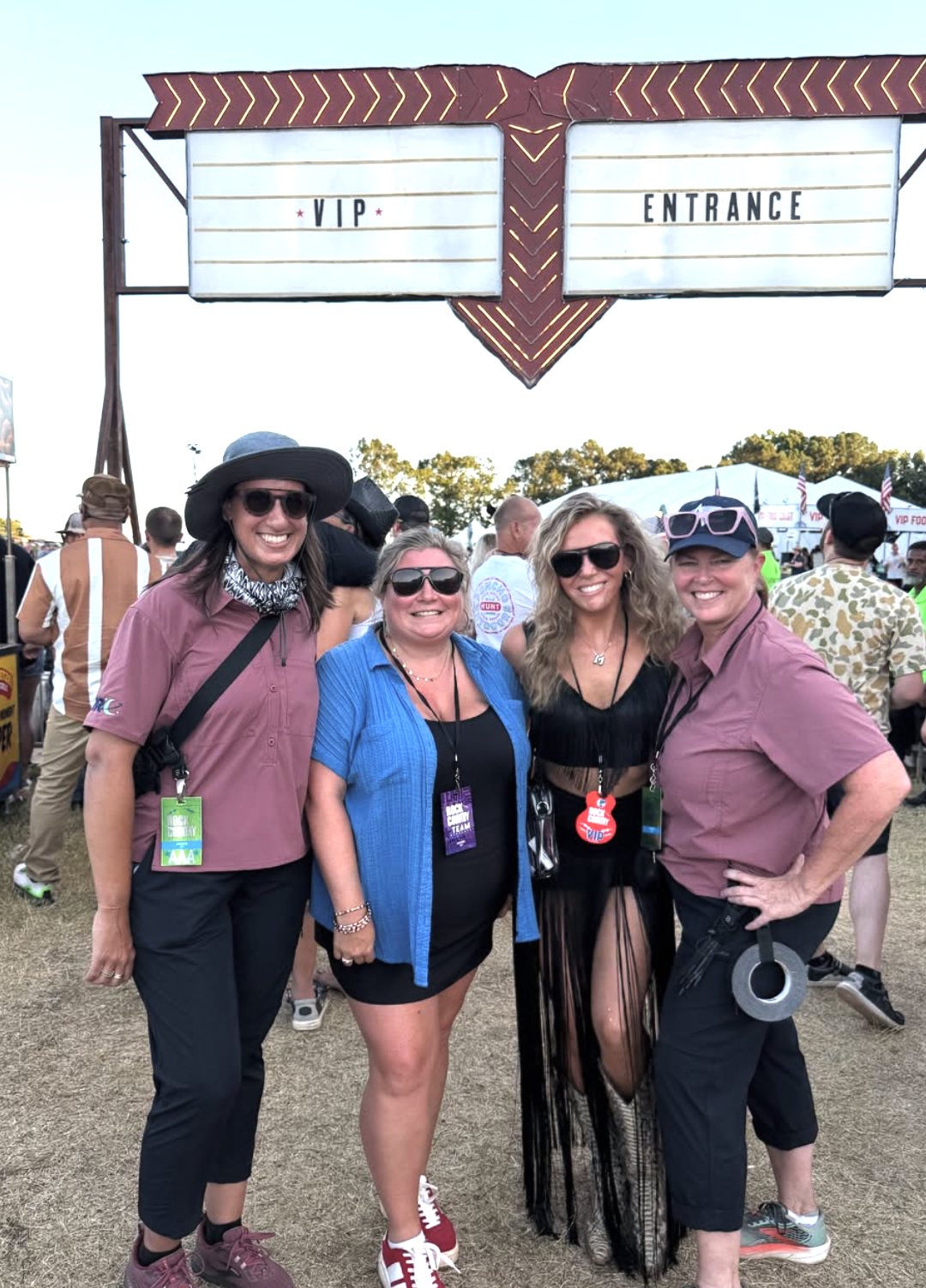 Madi and Tabi with the crew at the Rock the Country VIP entrance